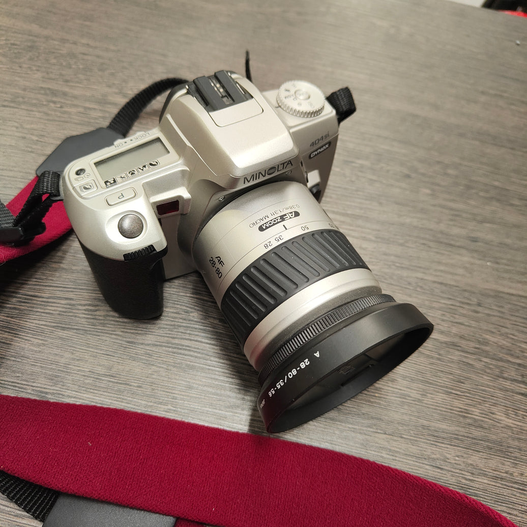 Tweedehands - Minolta 404si + 28-80mm AF Zoom