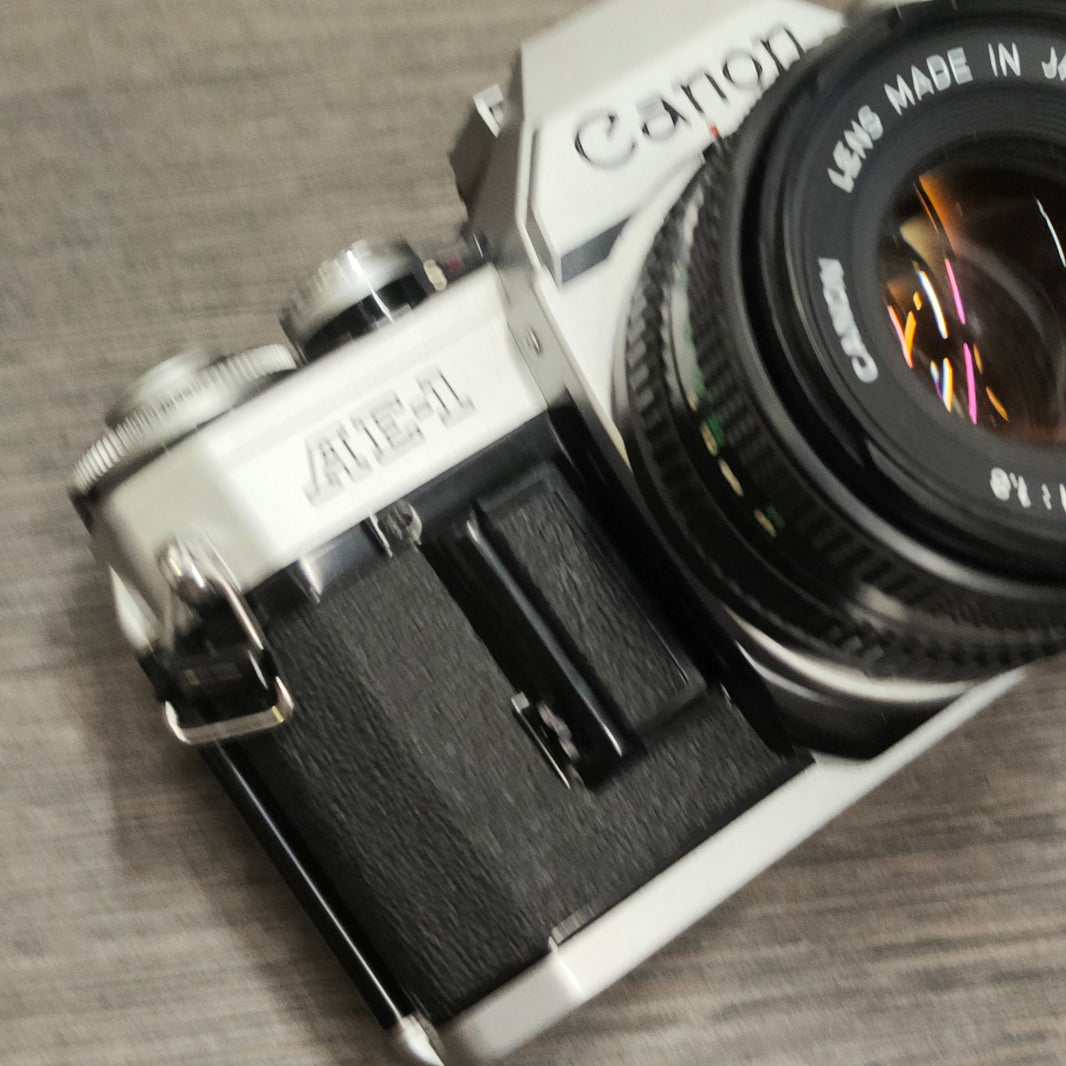 Tweedehands - Canon AE-1 + FD 50mm F1.8